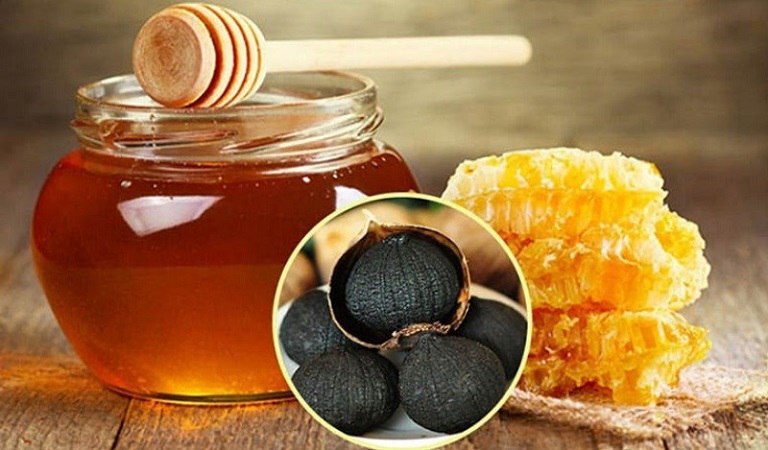 Chữa đau dạ dày bằng tỏi đen ngâm cùng mật ong nguyên chất